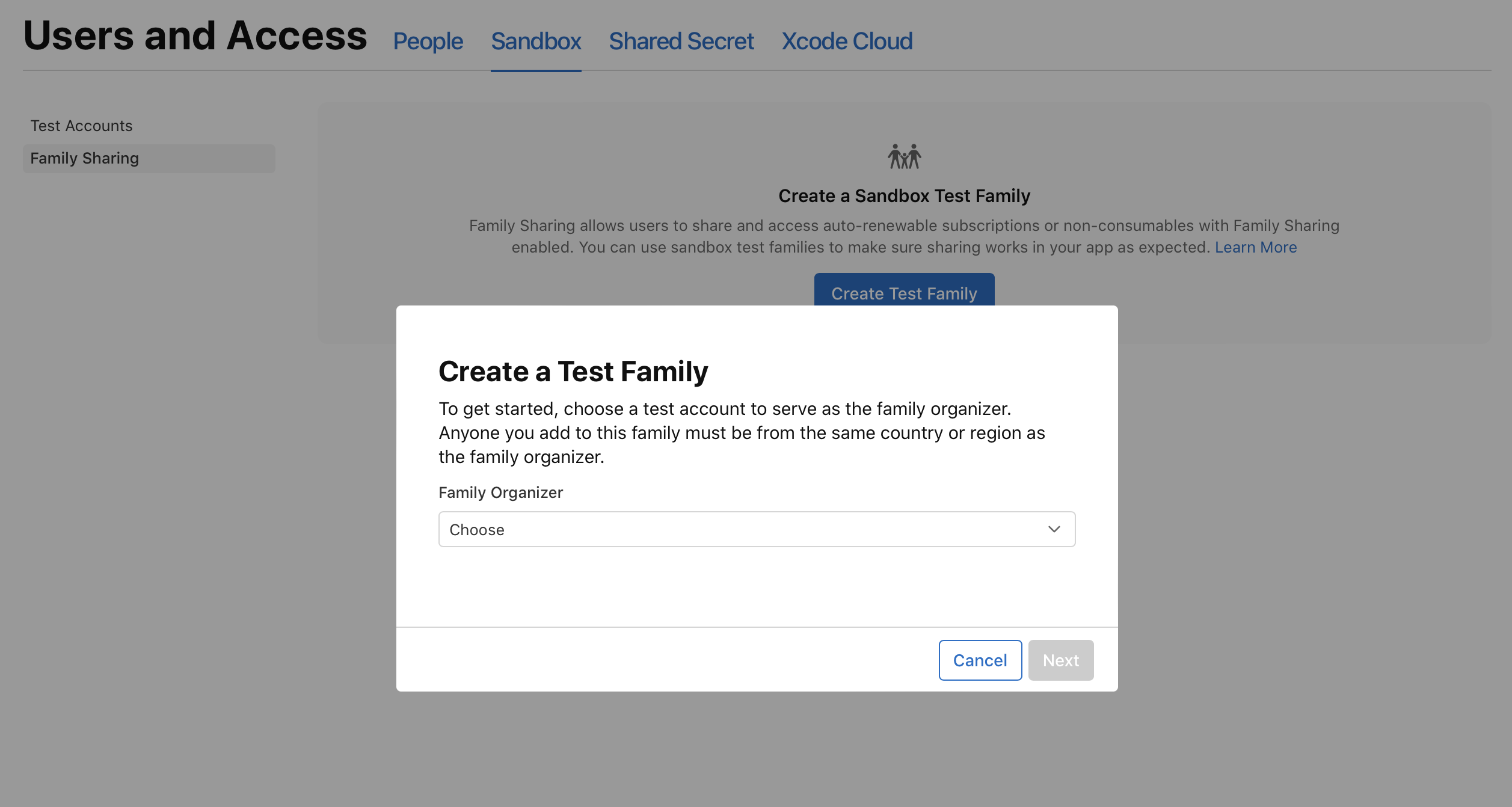 Family Sharing page showing the Create a test family dialog, with a menu for 'family organizer'.